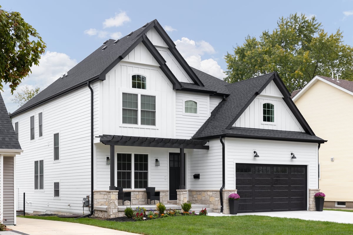 House with freshly painted white exterior siding